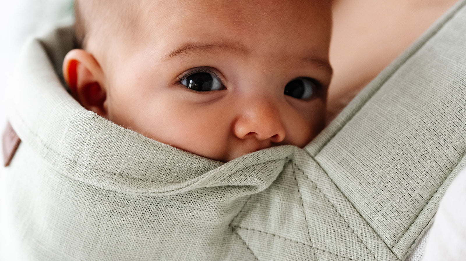 Maximize Breastfeeding Success: The Benefits of Babywearing Explained by an IBCLC